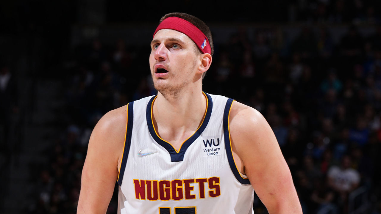 DENVER, CO - APRIL 7: Nikola Jokic #15 of the Denver Nuggets looks to pass the ball during the game against the Memphis Grizzlies on April 7, 2022 at the Ball Arena in Denver, Colorado. NOTE TO USER: User expressly acknowledges and agrees that, by downloading and/or using this Photograph, user is consenting to the terms and conditions of the Getty Images License Agreement. Mandatory Copyright Notice: Copyright 2022 NBAE