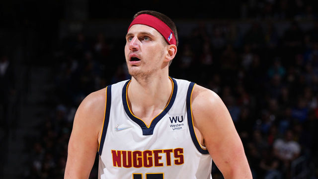 DENVER, CO - APRIL 7: Nikola Jokic #15 of the Denver Nuggets looks to pass the ball during the game against the Memphis Grizzlies on April 7, 2022 at the Ball Arena in Denver, Colorado. NOTE TO USER: User expressly acknowledges and agrees that, by downloading and/or using this Photograph, user is consenting to the terms and conditions of the Getty Images License Agreement. Mandatory Copyright Notice: Copyright 2022 NBAE