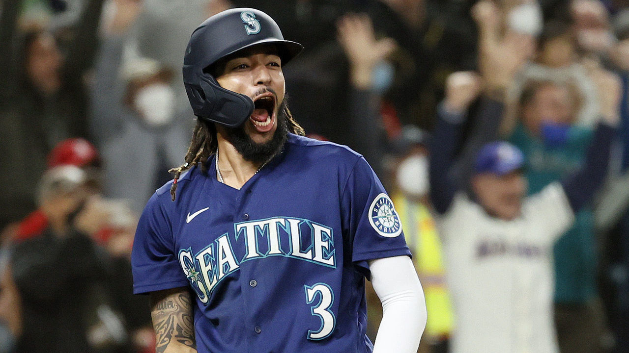 SEATTLE, WASHINGTON - OCTOBER 02: J.P. Crawford #3 of the Seattle Mariners reacts after scoring on a single by Mitch Haniger #17 during the eighth inning against the Los Angeles Angels at T-Mobile Park on October 02, 2021 in Seattle, Washington.