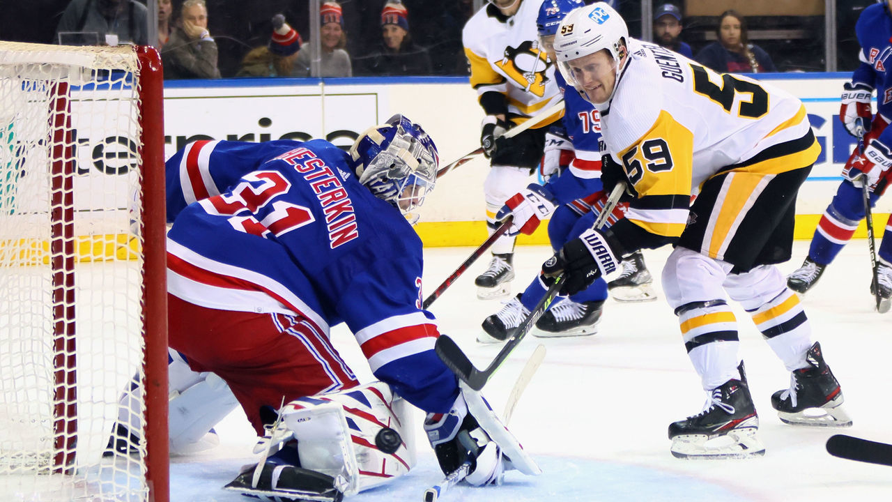 NEW YORK, NEW YORK - APRIL 07: Igor Shesterkin #31 of the New York Rangers makes a third period save on Jake Guentzel #59 of the Pittsburgh Penguins at Madison Square Garden on April 07, 2022 in New York City. The Rangers shut out the Penguins 3-0.