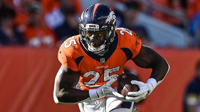 DENVER, CO - OCTOBER 3: Melvin Gordon #25 of the Denver Broncos runs against the Baltimore Ravens in the third quarter of a game at Empower Field at Mile High on October 3, 2021 in Denver, Colorado.