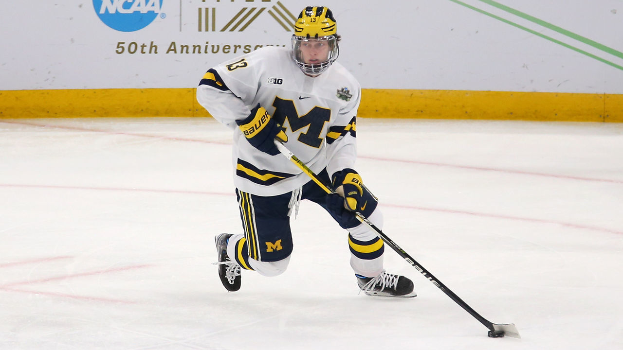 BOSTON, MA - APRIL 07: Michigan Wolverines forward Kent Johnson (13) skates with the puck during the Frozen Four of the Men's Div I NCAA Hockey Championship between Denver Pioneers and Michigan Wolverines on April 7, 2022, at TD Garden in Boston, MA.