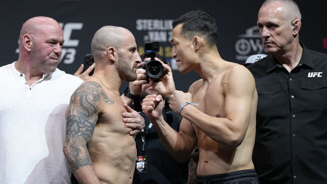 JACKSONVILLE, FLORIDA - APRIL 08: (L-R) Opponents Alexander Volkanovski of Australia and 'The Korean Zombie' Chan Sung Jung of South Korea face off during the UFC 273 ceremonial weigh-in at VyStar Veterans Memorial Arena on April 08, 2022 in Jacksonville, Florida.