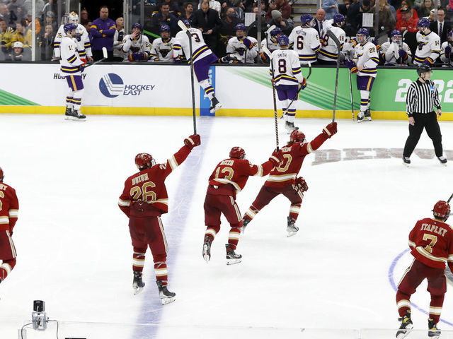 BOSTON, MA - APRIL 09: The Pioneers skate back to the bench after taking a 2-1 lead in the third period during the NCAA Frozen Four final between the Denver Pioneers and the Minnesota State Mavericks on April 9, 2022, at TD Garden in Boston, Massachusetts.