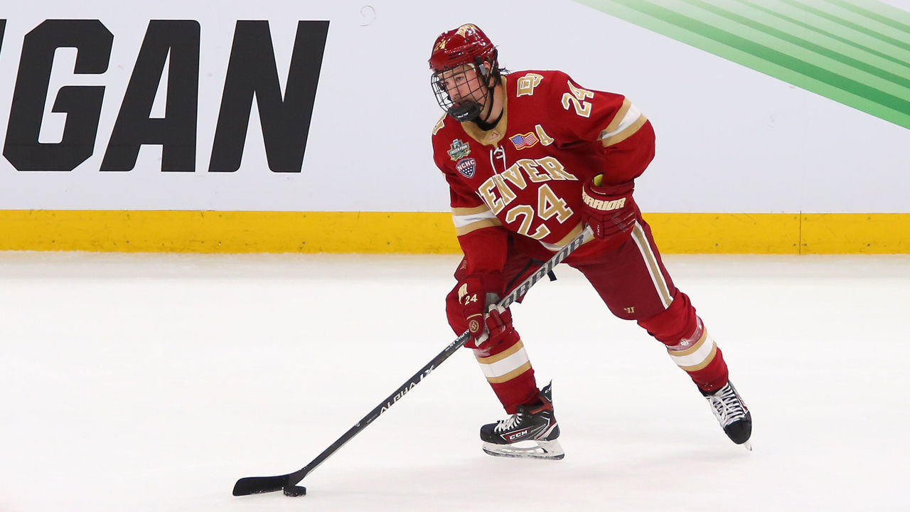 BOSTON, MA - APRIL 07: Denver Pioneers forward Bobby Brink (24) with the puck during the Frozen Four of the Men's Div I NCAA Hockey Championship between Denver Pioneers and Michigan Wolverines on April 7, 2022, at TD Garden in Boston, MA.