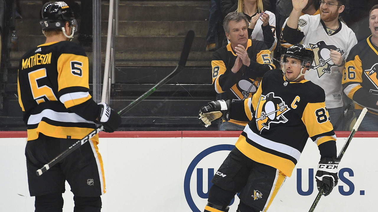 PITTSBURGH, PA - APRIL 10: Sidney Crosby #87 of the Pittsburgh Penguins celebrates with Mike Matheson #5 after scoring a goal in the first period during the game against the Nashville Predators at PPG PAINTS Arena on April 20, 2022 in Pittsburgh, Pennsylvania.