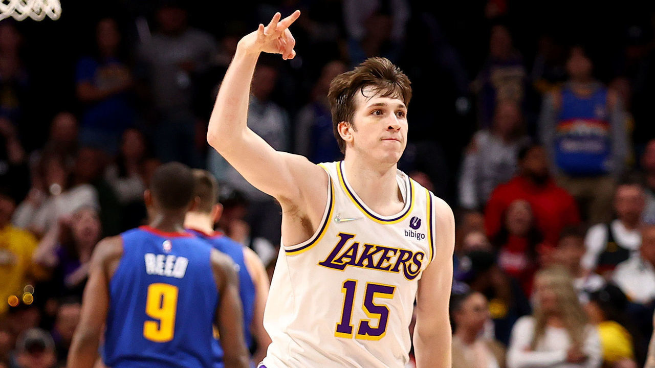 DENVER, CO - APRIL 10: Austin Reaves #15 of the Los Angeles Lakers reacts after hitting a three pointer against the Denver Nuggets at Ball Arena on April 10, 2022 in Denver, Colorado. NOTE TO USER: User expressly acknowledges and agrees that, by downloading and/or using this Photograph, user is consenting to the terms and conditions of the Getty Images License Agreement.
