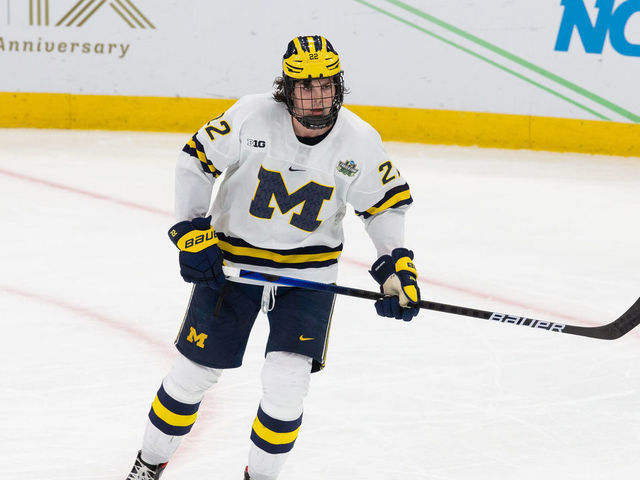 BOSTON, MA - APRIL 7: Owen Power #22 of the Michigan Wolverines warms up before a game against the Denver Pioneers during game one of the 2022 NCAA Division I Men's Hockey Frozen Four Championship semifinal at TD Garden on April 7, 2022 in Boston, Massachusetts. The Pioneers won 3-2 in overtime to advance to the national championship game.