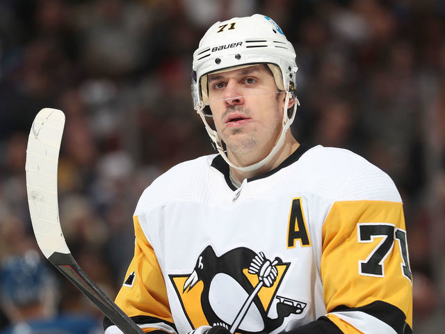 DENVER, COLORADO - APRIL 02: Evgeni Malkin #71 of the Pittsburgh Penguins looks on against the Colorado Avalanche at Ball Arena on April 2, 2022 in Denver, Colorado.