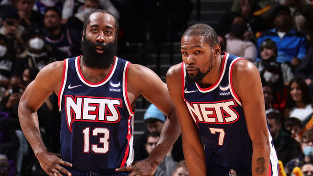 BROOKLYN, NY - JANUARY 1: James Harden #13 and Kevin Durant #7 of the Brooklyn Nets look on during the game against the LA Clippers on January 1, 2022 at Barclays Center in Brooklyn, New York. Mandatory Copyright Notice: Copyright 2021 NBAE