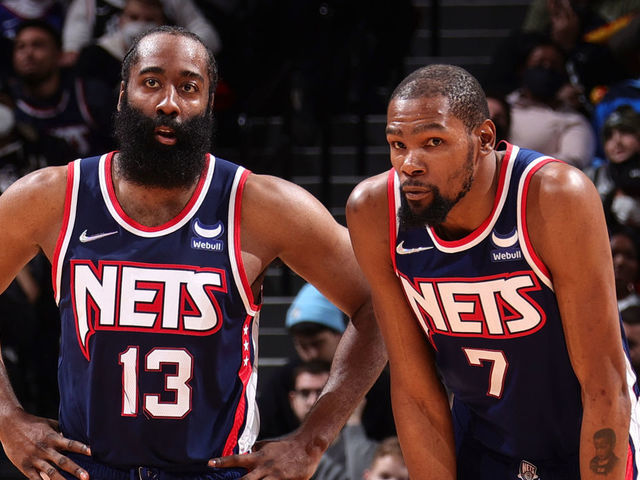 BROOKLYN, NY - JANUARY 1: James Harden #13 and Kevin Durant #7 of the Brooklyn Nets look on during the game against the LA Clippers on January 1, 2022 at Barclays Center in Brooklyn, New York. Mandatory Copyright Notice: Copyright 2021 NBAE