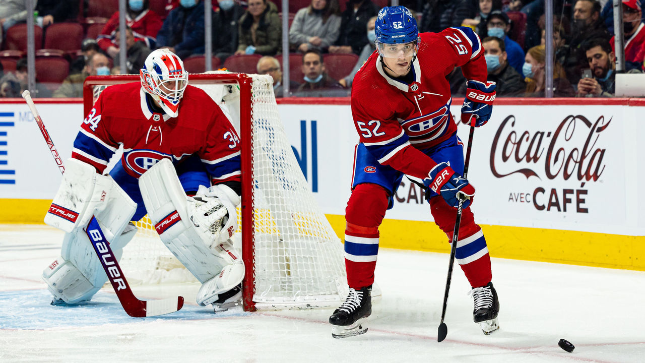 MONTREAL, QC - APRIL 5: Justin Barron #52 of the Montreal Canadiens controls the puck against the Ottawa Senators in the NHL game at the Bell Centre on April 5, 2022 in Montreal, Quebec, Canada.