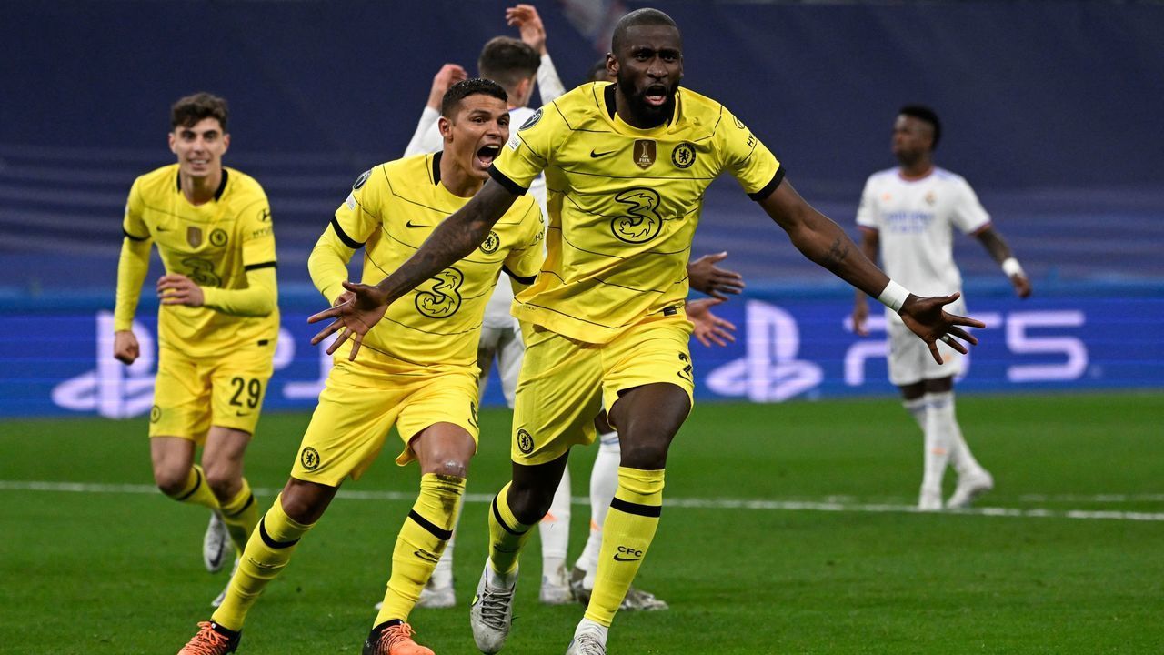 Chelsea's German defender Antonio Ruediger (C) celebrates after scoring a goal during the UEFA Champions League quarter final second leg football match between Real Madrid CF and Chelsea FC at the Santiago Bernabeu stadium in Madrid on April 12, 2022.
