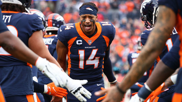 DENVER, COLORADO - JANUARY 08: Courtland Sutton #14 of the Denver Broncos high fives teammates prior to facing the Kansas City Chiefs at Empower Field At Mile High on January 08, 2022 in Denver, Colorado.