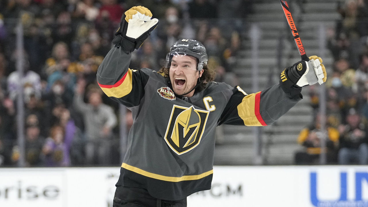 LAS VEGAS, NEVADA - JANUARY 17: The Vegas Golden Knights celebrate after a goal by Evgenii Dadonov #63 during the first period of a game against the Pittsburgh Penguins at T-Mobile Arena on January 17, 2022 in Las Vegas, Nevada.