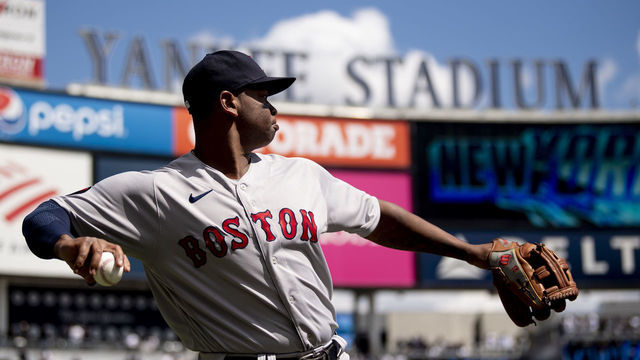 NEW YORK, NY - APRIL 8: Rafael Devers #11 of the Boston Red Sox throws before the 2022 Major League Baseball Opening Day game against the New York Yankees on April 8, 2022 at Yankee Stadium in the Bronx borough of New York City.