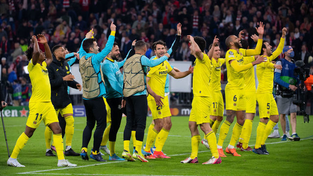 12 April 2022, Bavaria, Munich: Soccer: Champions League, Bayern Munich - Villarreal FC, knockout round, quarterfinals, second leg at Allianz Arena. Villarreal players celebrate after the match. Photo: Sven Hoppe/dpa