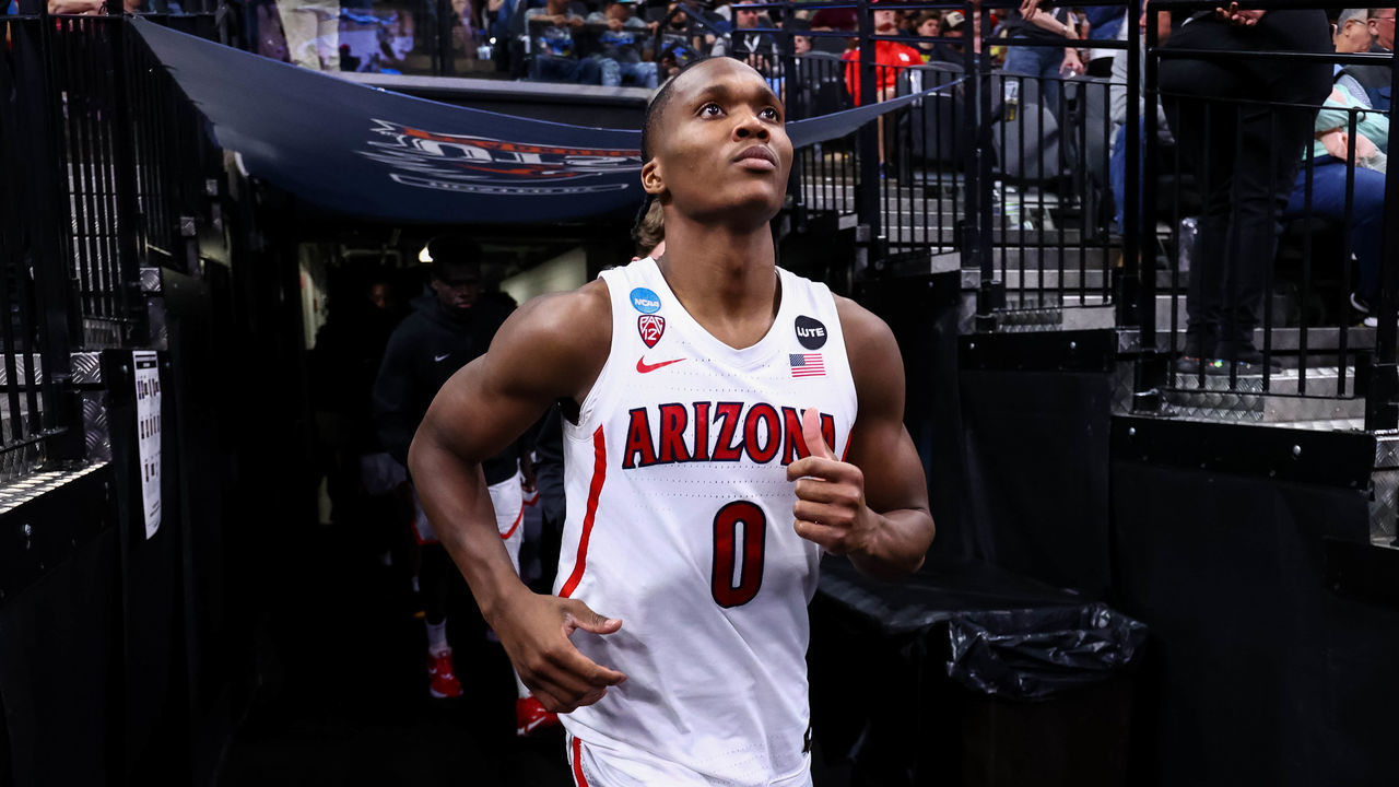 SAN ANTONIO, TX - MARCH 24: Bennedict Mathurin #0 of the Arizona Wildcats runs out of the tunnel at halftime during the Sweet 16 round of the 2022 NCAA Men's Basketball Tournament held at AT&T Center on March 24, 2022 in San Antonio, Texas.