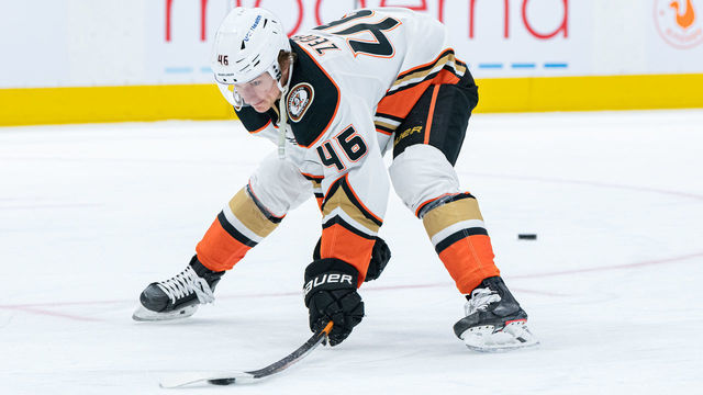 TORONTO, ON - JANUARY 26: Anaheim Ducks Center Trevor Zegras (46) attempts to lift the puck before the NHL regular season game between the Anaheim Ducks and the Toronto Maple Leafs on January 26, 2022, at Scotiabank Arena in Toronto, ON, Canada.