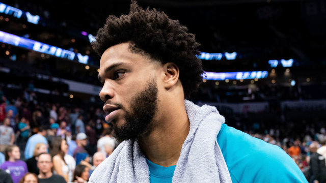 CHARLOTTE, NORTH CAROLINA - APRIL 07: Miles Bridges #0 of the Charlotte Hornets walks off the court after defeating the Orlando Magic during their game at Spectrum Center on April 07, 2022 in Charlotte, North Carolina.