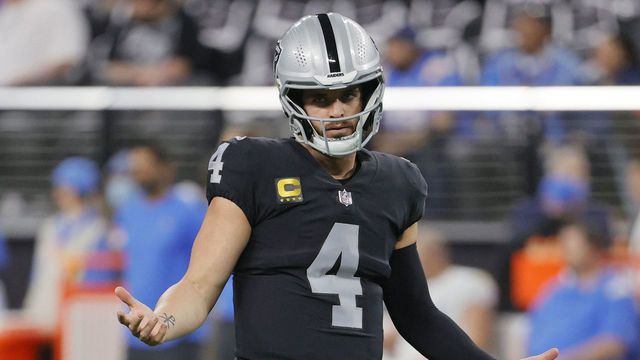 LAS VEGAS, NEVADA - JANUARY 09: Quarterback Derek Carr #4 of the Las Vegas Raiders gestures during warmups before a game against the Los Angeles Chargers at Allegiant Stadium on January 9, 2022 in Las Vegas, Nevada. The Raiders defeated the Chargers 35-32 in overtime.