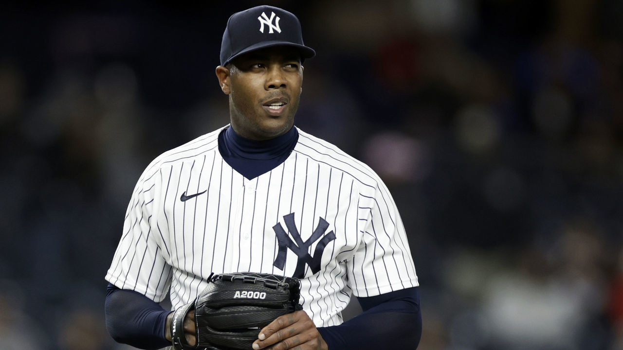 NEW YORK, NY - APRIL 14: Aroldis Chapman #54 of the New York Yankees reacts after walking the bases loaded against the Toronto Blue Jays during the ninth inning at Yankee Stadium on April 14, 2022 in the Bronx borough of New York City. The Yankees won 3-0.