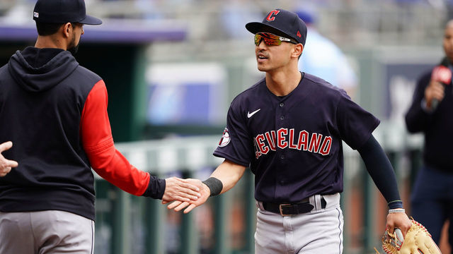 KANSAS CITY, MISSOURI - APRIL 11: Steven Kwan #38 of the Cleveland Guardians greets teammates before the game against the Kansas City Royals at Kauffman Stadium on April 11, 2022 in Kansas City, Missouri.