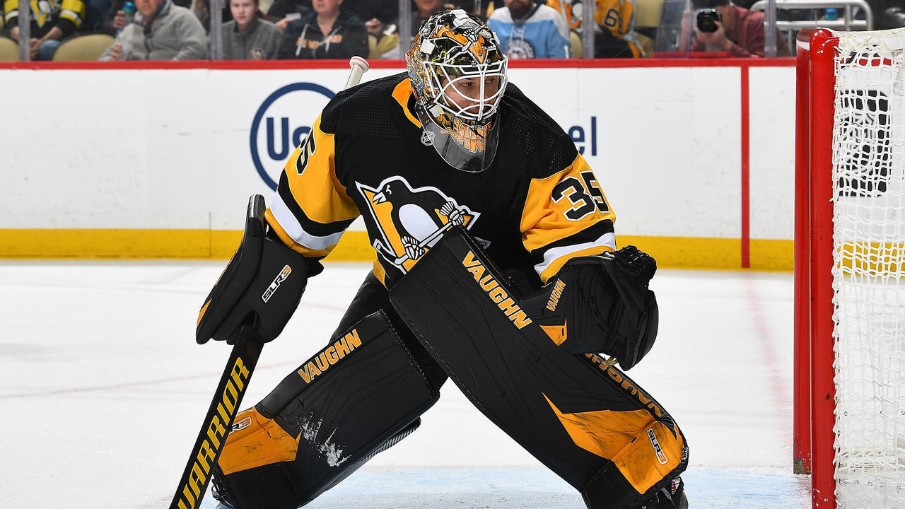 PITTSBURGH, PA - MARCH 29: Tristan Jarry #35 of the Pittsburgh Penguins defends the net against the New York Rangers at PPG PAINTS Arena on March 29, 2022 in Pittsburgh, Pennsylvania.