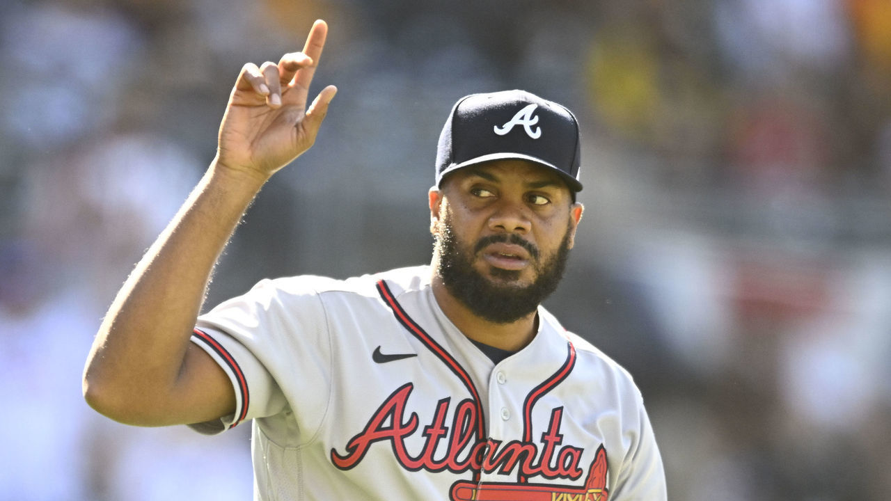 SAN DIEGO, CA - APRIL 16: Kenley Jansen #74 of the Atlanta Braves points skyward after the Braves beat the San Diego Padres 5-2 in a baseball game on April 16, 2022 at Petco Park in San Diego, California.
