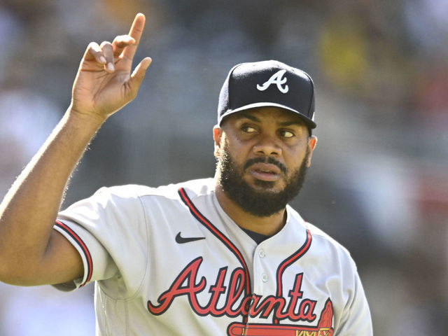 SAN DIEGO, CA - APRIL 16: Kenley Jansen #74 of the Atlanta Braves points skyward after the Braves beat the San Diego Padres 5-2 in a baseball game on April 16, 2022 at Petco Park in San Diego, California.