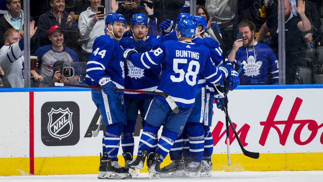 TORONTO, ON - APRIL 17: William Nylander #88 of the Toronto Maple Leafs celebrates his goal against the New York Islanders with teammates Morgan Rielly #44, Michael Bunting #58 and Mitch Marner #16 during the second period at the Scotiabank Arena on April 17, 2022 in Toronto, Ontario, Canada.