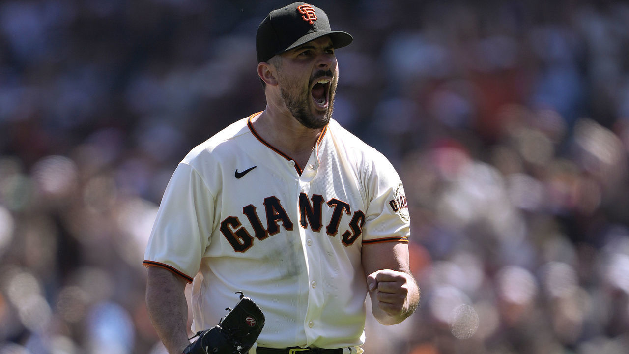 SAN FRANCISCO, CALIFORNIA - APRIL 09: Carlos Rodon #16 of the San Francisco Giants reacts after striking out Garrett Cooper #26 of the Miami Marlins to end the top of the fifth inning at Oracle Park on April 09, 2022 in San Francisco, California.