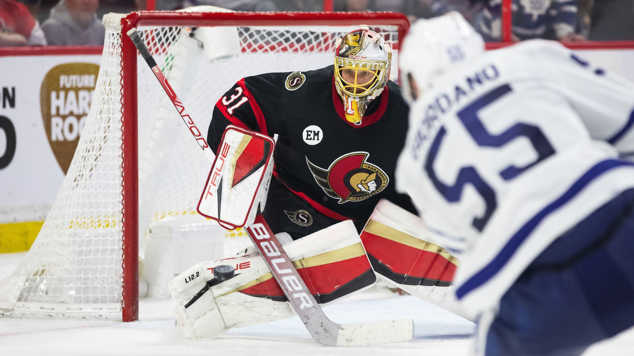 OTTAWA, ON - APRIL 16: Ottawa Senators Goalie Anton Forsberg (31) faces a shot Toronto Maple Leafs Defenceman Mark Giordano (55) that went in for the game winning goal during overtime National Hockey League action between the Toronto Maple Leafs and Ottawa Senators on April 16, 2022, at Canadian Tire Centre in Ottawa, ON, Canada.