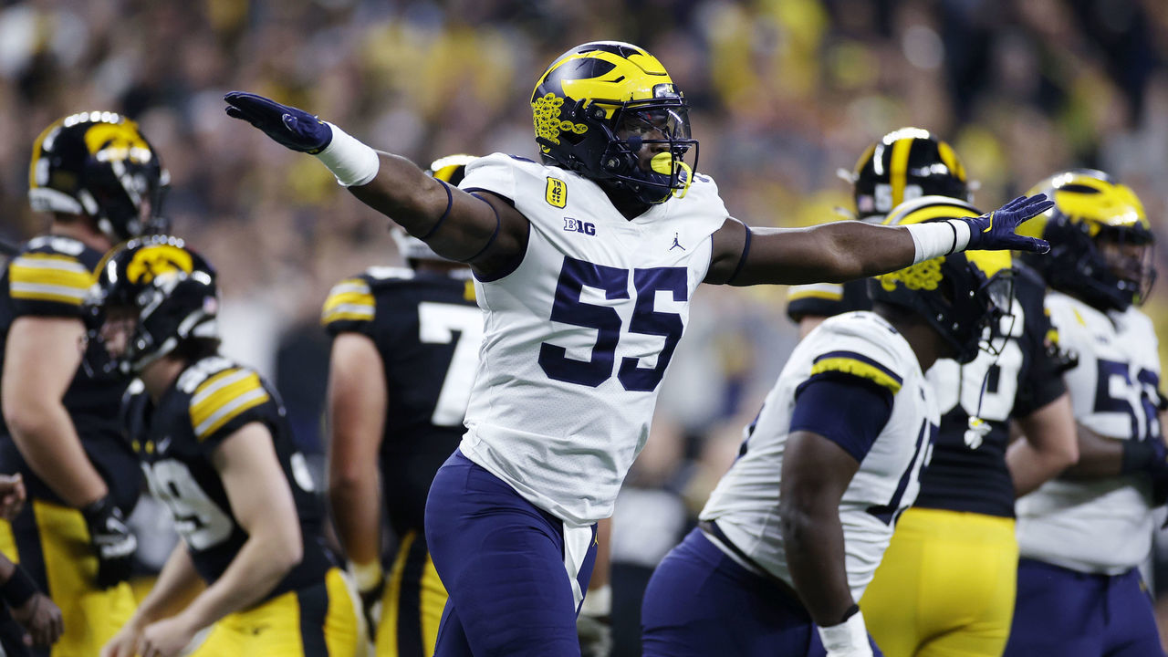 INDIANAPOLIS, IN - DECEMBER 04: Michigan Wolverines linebacker David Ojabo (55) celebrates after a missed field goal by the Iowa Hawkeyes during the Big Ten Championship college football game on Dec. 4, 2021 at Lucas Oil Stadium in Indianapolis, Indiana.