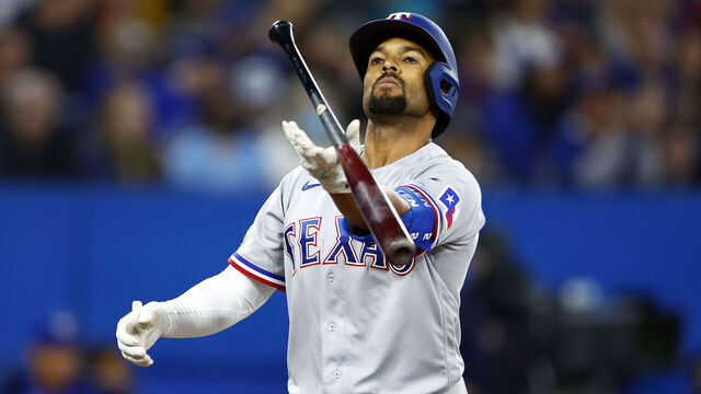 TORONTO, ON - APRIL 10: Marcus Semien #2 of the Texas Rangers tosses his bat after striking out in the fourth inning during a MLB game against the Toronto Blue Jays at Rogers Centre on April 10, 2022 in Toronto, Ontario, Canada.