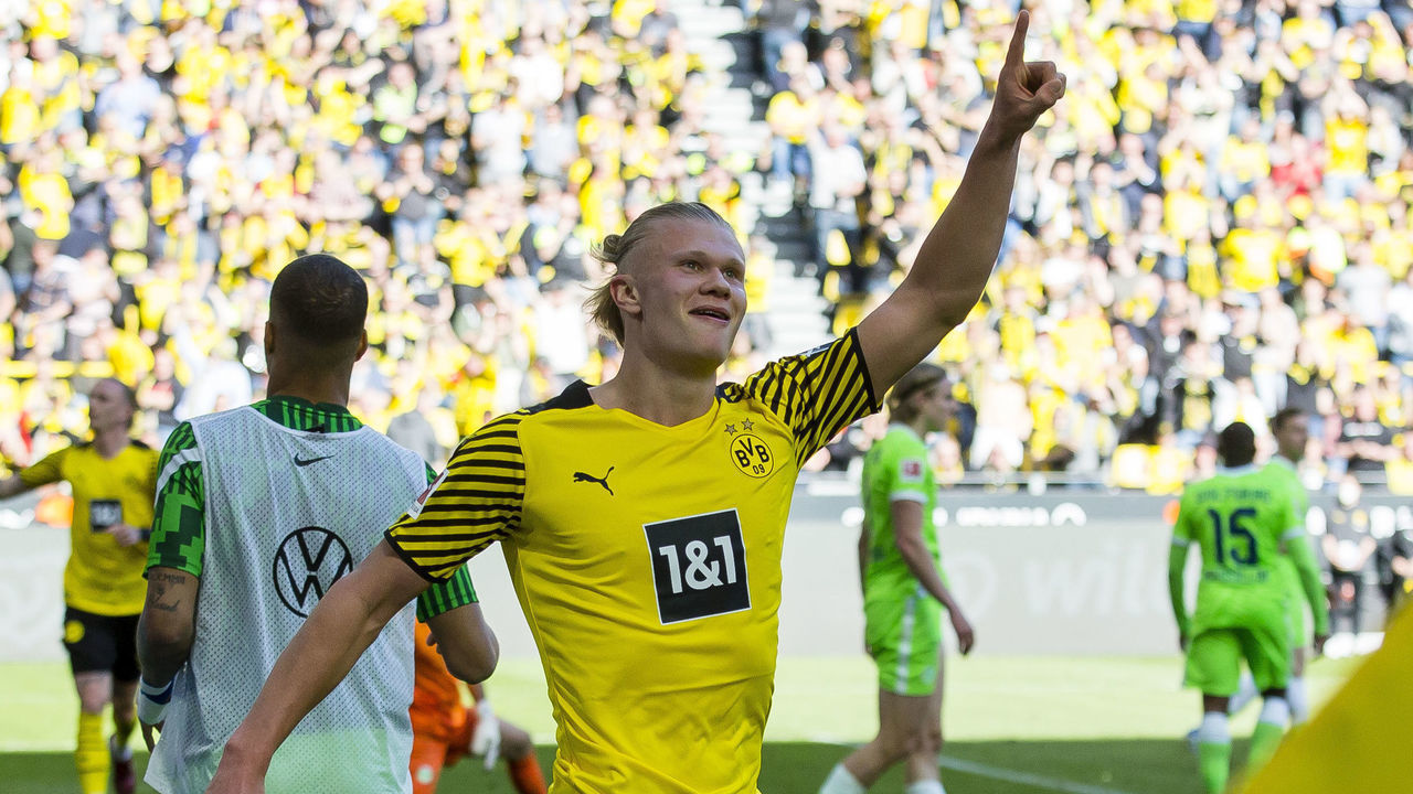 DORTMUND, GERMANY - APRIL 16: Erling Haaland of Borussia Dortmund cheers after scoring his teams 6th goal during the Bundesliga match between Borussia Dortmund and VfL Wolfsburg at Signal Iduna Park on April 16, 2022 in Dortmund, Germany.