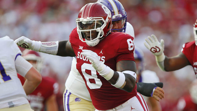 NORMAN, OK - SEPTEMBER 11: Defensive linemen Perrion Winfrey #8 and Isaiah Thomas #95 of the Oklahoma Sooners rush quarterback Rogan Wells #11 of the Western Carolina Catamounts at Gaylord Family Oklahoma Memorial Stadium on September 11, 2021 in Norman, Oklahoma. Oklahoma won 76-0.