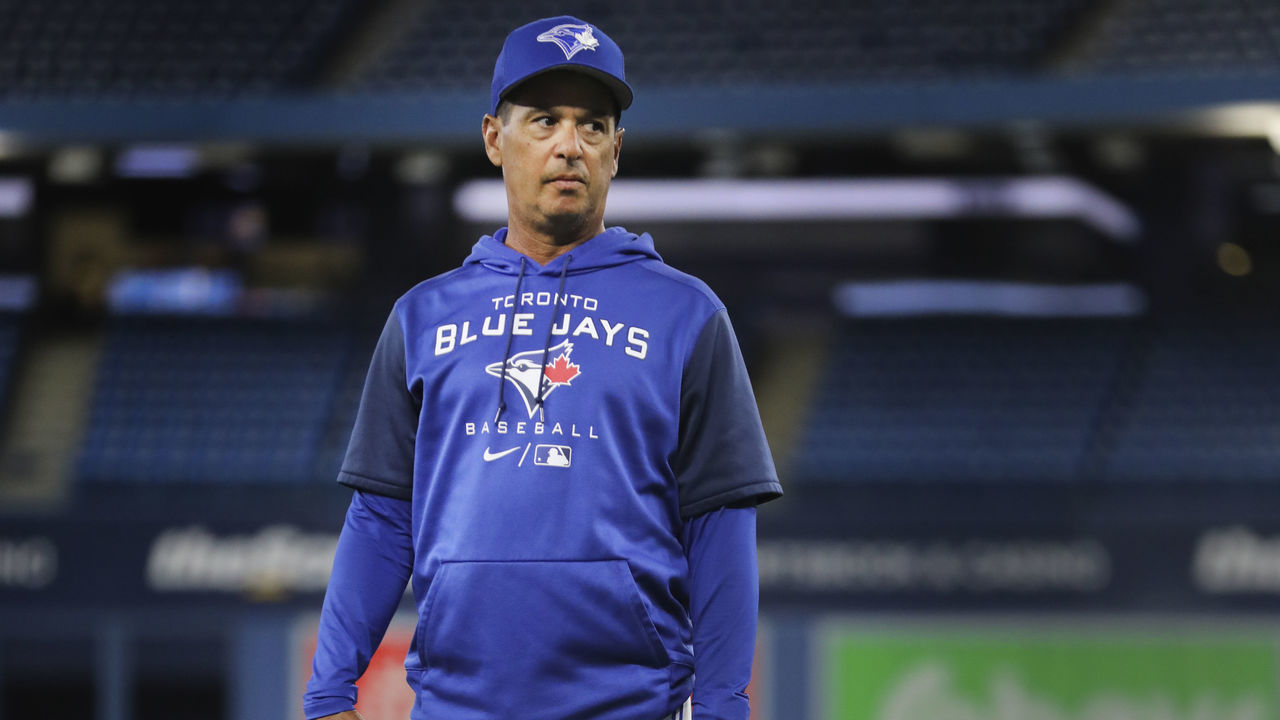 TORONTO, ON - April 7 - Jays Manager Charlie Montoyo keeps an eye on things. The day before the Toronto Blue Jays home opener, the Jays and Texas Rangers took to the field at the Rogers Centre to workout. April 7 2022 (Richard Lautens/Toronto Star via Getty Images)