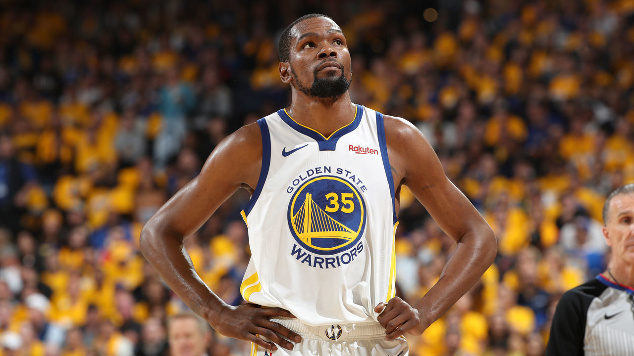 OAKLAND, CA - MAY 8: Kevin Durant #35 of the Golden State Warriors looks on against the Houston Rockets during Game Five of the Western Conference Semifinals of the 2019 NBA Playoffs on May 8, 2019 at ORACLE Arena in Oakland, California. NOTE TO USER: User expressly acknowledges and agrees that, by downloading and/or using this photograph, user is consenting to the terms and conditions of Getty Images License Agreement. Mandatory Copyright Notice: Copyright 2019 NBAE