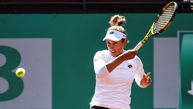 ISTANBUL, TURKIYE - APRIL 20: Elise Mertens of Belgium in action against Rebecca Peterson (not seen) of Sweden during TEB BNP Paribas Tennis Championship Istanbul women's clay court tournament at TTF Istanbul Tennis Center, Istanbul, Turkiye on April 20, 2022.