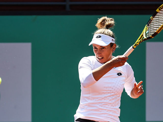 ISTANBUL, TURKIYE - APRIL 20: Elise Mertens of Belgium in action against Rebecca Peterson (not seen) of Sweden during TEB BNP Paribas Tennis Championship Istanbul women's clay court tournament at TTF Istanbul Tennis Center, Istanbul, Turkiye on April 20, 2022.