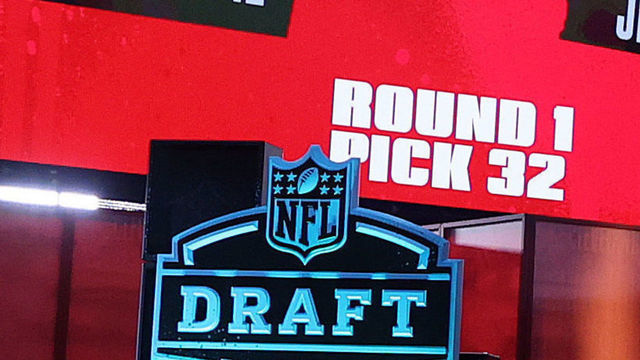 CLEVELAND, OHIO - APRIL 29: Joe Tryon is announced as the 32nd pick to the Tampa Bay Buccaneers during round one of the 2021 NFL Draft at the Great Lakes Science Center on April 29, 2021 in Cleveland, Ohio.