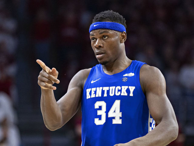 FAYETTEVILLE, ARKANSAS - FEBRUARY 26: Oscar Tshiebwe #34 of the Kentucky Wildcats points to the bench during a game against the Arkansas Razorbacks at Bud Walton Arena on February 26, 2022 in Fayetteville, Arkansas. The Razorbacks defeated the Wildcats 75-73.
