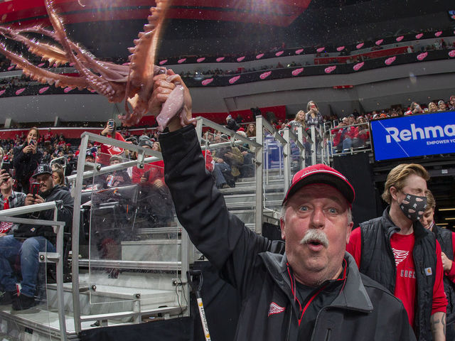 DETROIT, MI - FEBRUARY 02: The Detroit Red Wings building operations manager Al Sobotka waives an octopus around to fire up the crowd during the third period of an NHL game against the Los Angeles Kings at Little Caesars Arena on February 2, 2022 in Detroit, Michigan. Los Angeles defeated Detroit 5-3.
