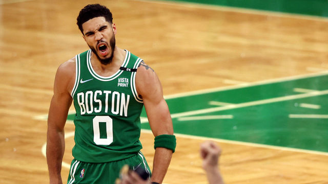 BOSTON, MASSACHUSETTS - APRIL 20: Jayson Tatum #0 of the Boston Celtics celebrates after hitting a three point shot against the Brooklyn Nets during the fourth quarter of Game Two of the Eastern Conference First Round NBA Playoffs at TD Garden on April 20, 2022 in Boston, Massachusetts. The Celtics defeat the Nets 114-107.