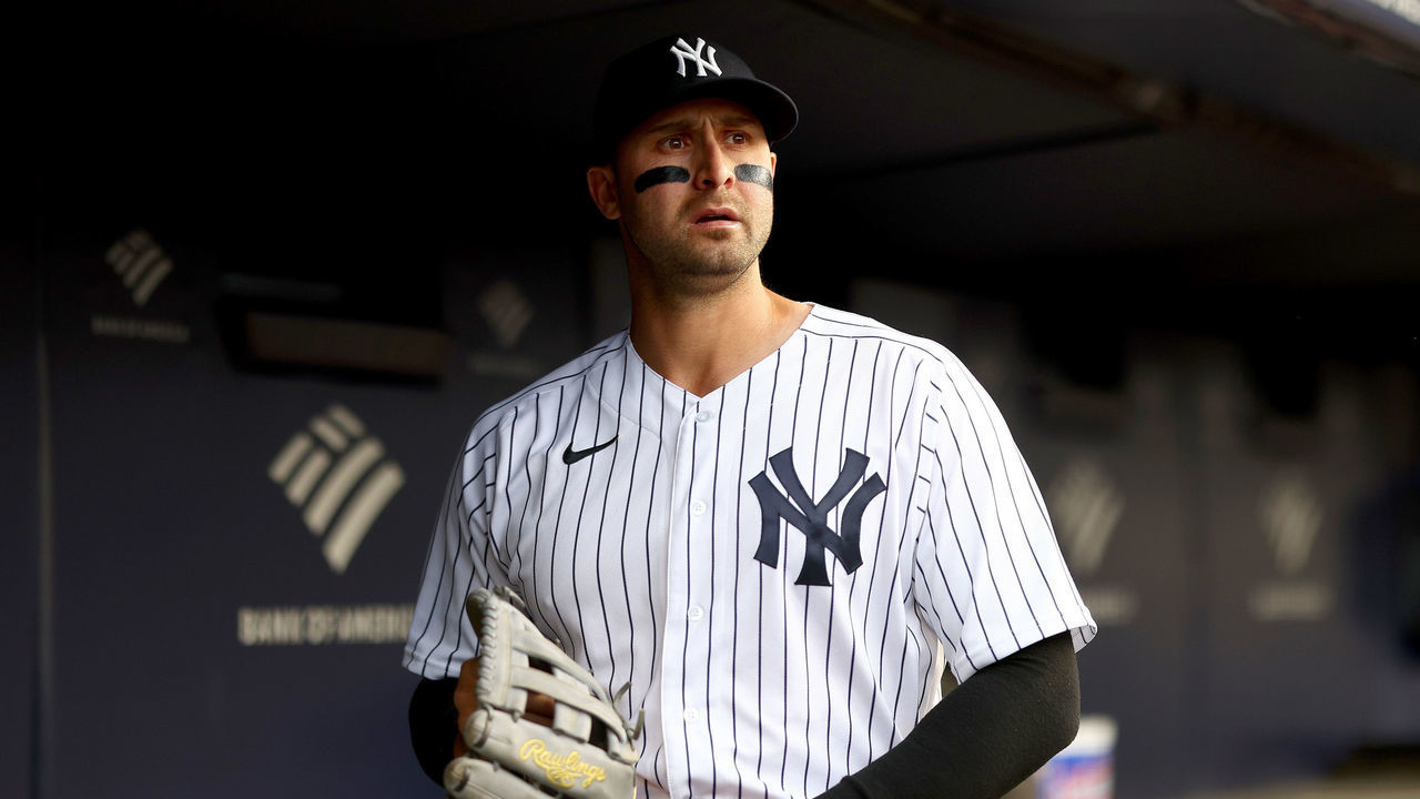 NEW YORK, NEW YORK - APRIL 11: Joey Gallo #13 of the New York Yankees walks in the dugout before the game against the Toronto Blue Jays at Yankee Stadium on April 11, 2022 in the Bronx borough of New York City.