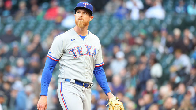 SEATTLE, WASHINGTON - APRIL 19: Jon Gray #22 of the Texas Rangers reacts after the first inning against the Seattle Mariners at T-Mobile Park on April 19, 2022 in Seattle, Washington.