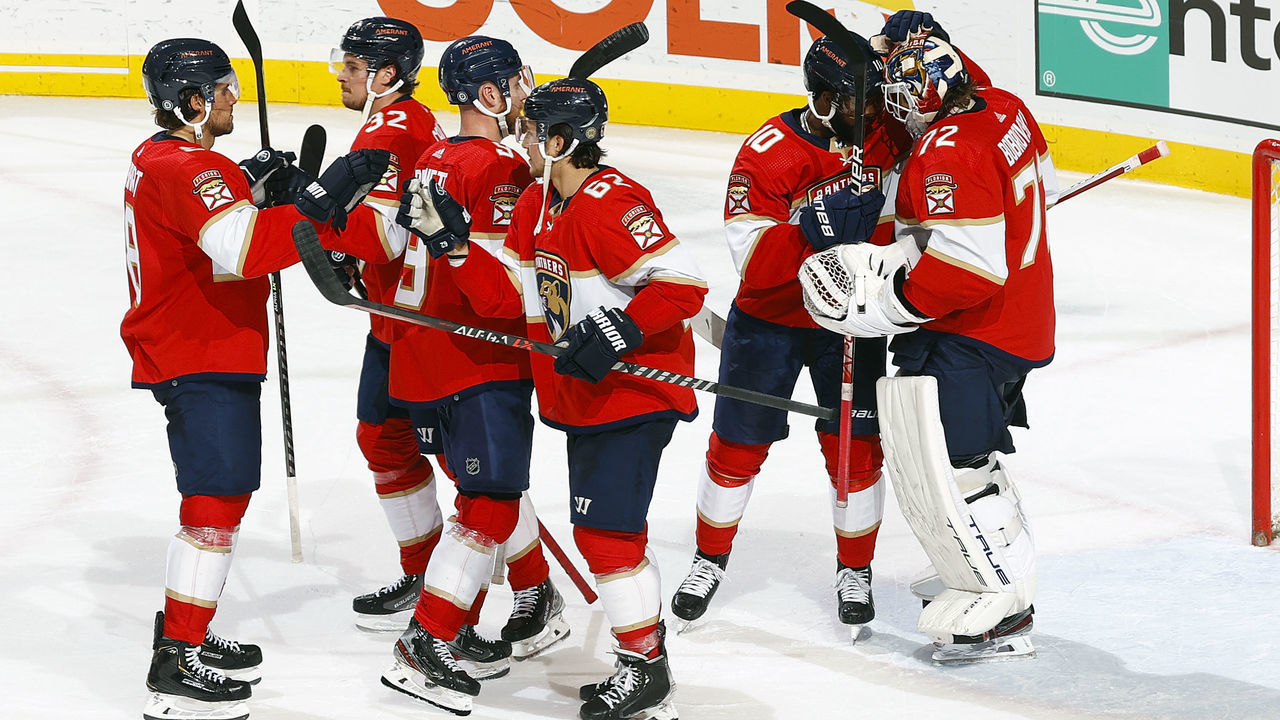 SUNRISE, FL - APRIL 21: Teammates line up to congratulate goaltender Sergei Bobrovsky #72 of the Florida Panthers after they defeated the Detroit Red Wings 5-2 at the FLA Live Arena on April 21, 2022 in Sunrise, Florida.