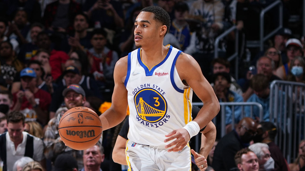 DENVER, CO - APRIL 21: Jordan Poole #3 of the Golden State Warriors dribbles the ball against the Denver Nuggets during Round 1 Game 3 of the 2022 NBA Playoffs on April 21, 2022 at the Ball Arena in Denver, Colorado. NOTE TO USER: User expressly acknowledges and agrees that, by downloading and/or using this Photograph, user is consenting to the terms and conditions of the Getty Images License Agreement. Mandatory Copyright Notice: Copyright 2022 NBAE