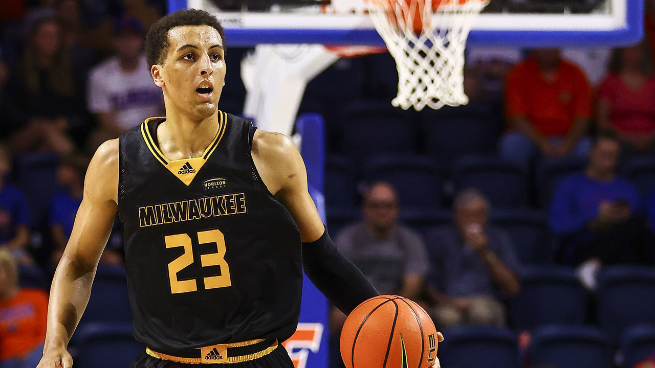 GAINESVILLE, FLORIDA - NOVEMBER 18: Patrick Baldwin Jr. #23 of the Milwaukee Panthers dribbles the ball during the first half of a game against the Florida Gators at the Stephen C. O'Connell Center on November 18, 2021 in Gainesville, Florida.